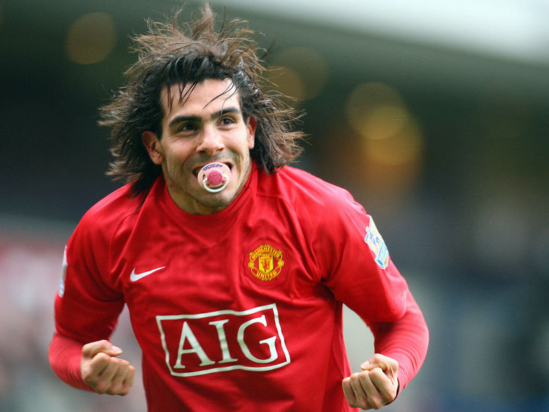 http://www.football-pictures.net/data/media/269/Carlos-Tevez-Manchester.jpg