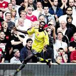 Adebayor yellow 1